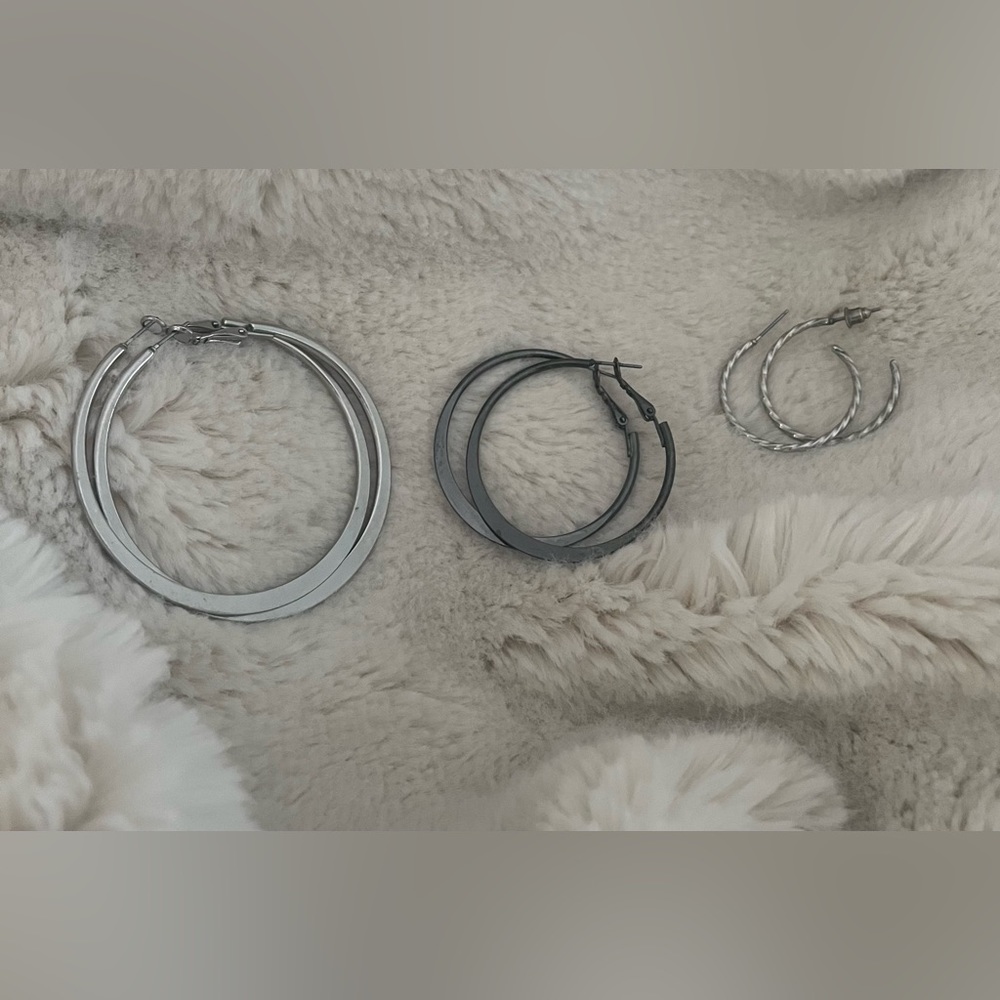 3 hoop earrings for the price of one! Silver colored and dark silver.